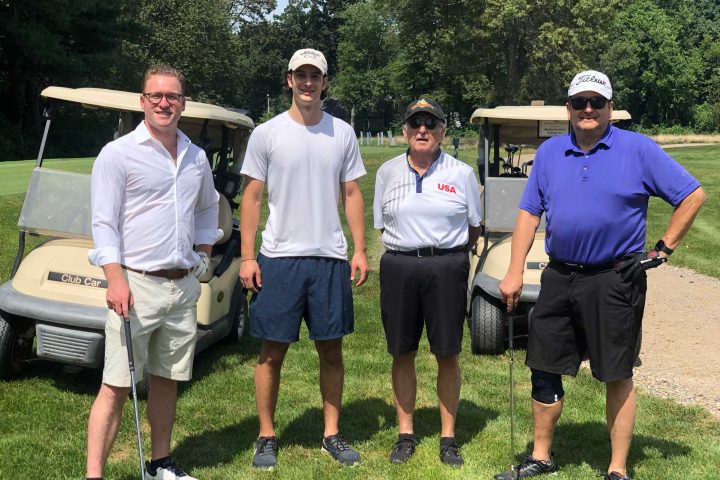 Four man team at the Frankel Kinsler Golf Tournament