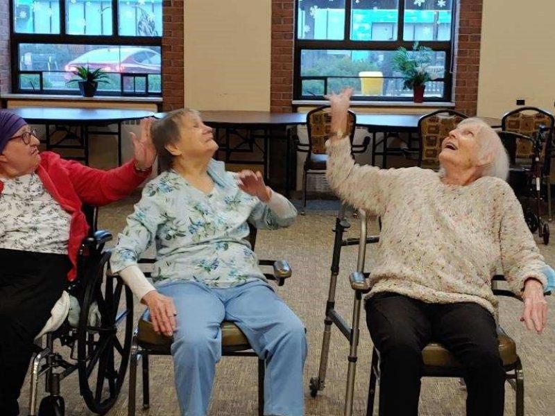 Residents play volleyball