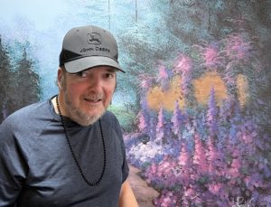 Brian in front of his favorite painting