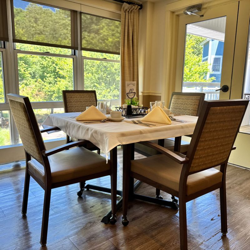 A table set for dinner in the dining hall.